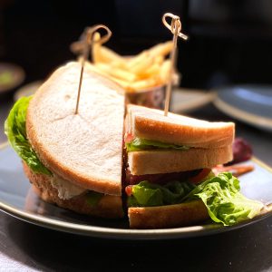 The Falcon Club sandwich, served with skinny fries